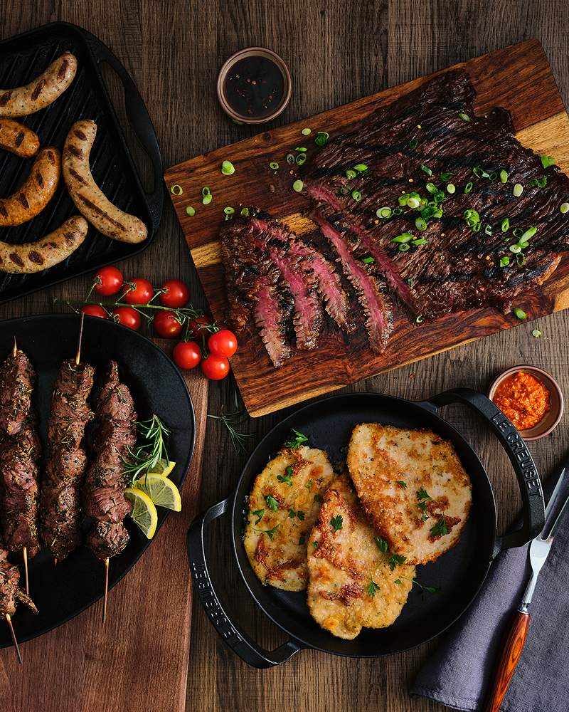A spread of cooked specialty items from the Butcher Shop
