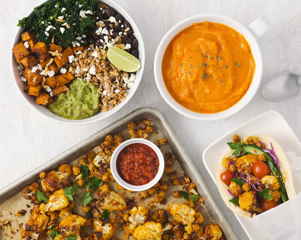 Southwest kale bowl, carrot ginger soup, and sheet-pan roasted chickpea and cauliflower pita