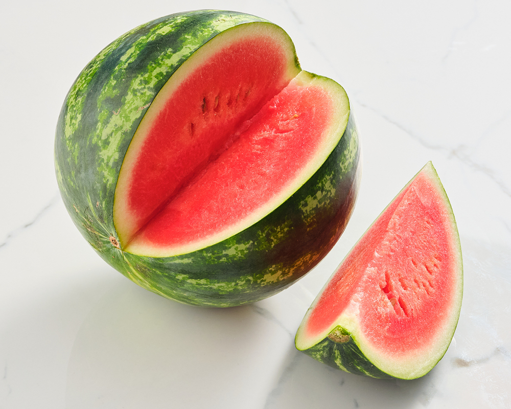 Watermelon with cut wedge