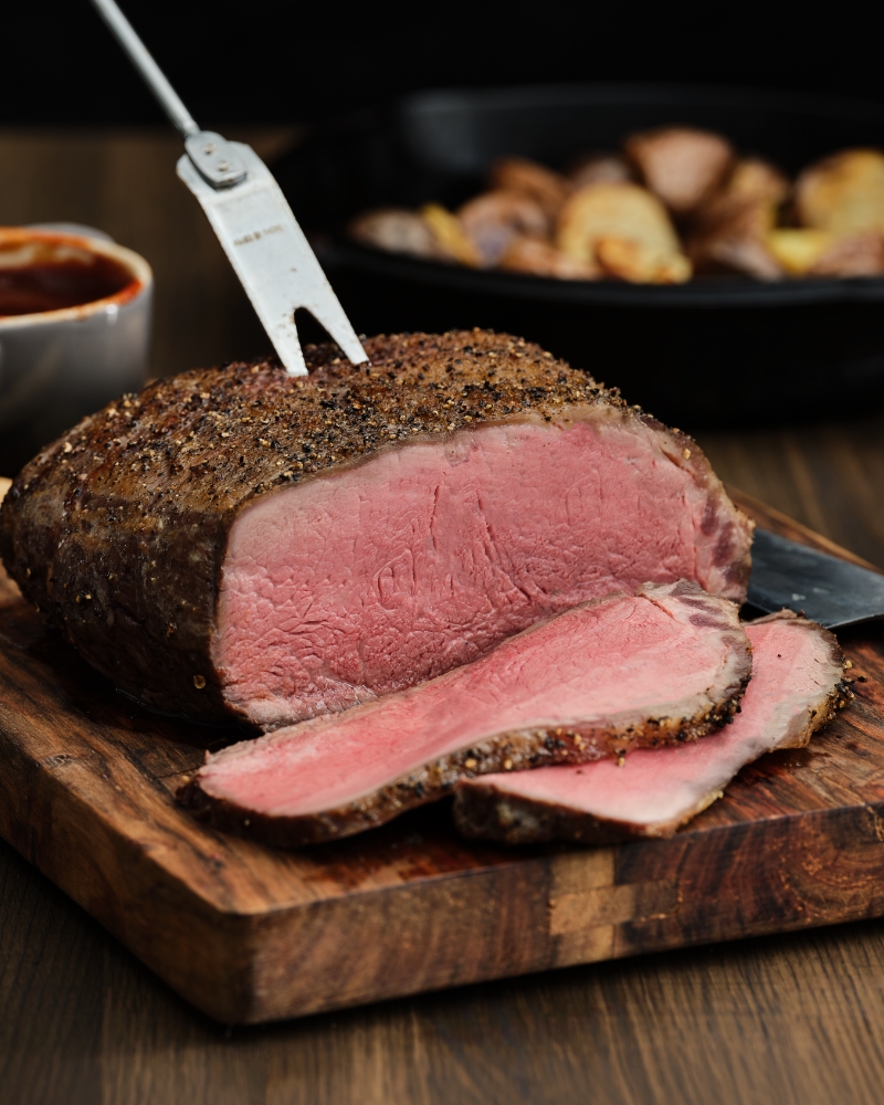NY Strip Roast Cut Into with BBQ Fork