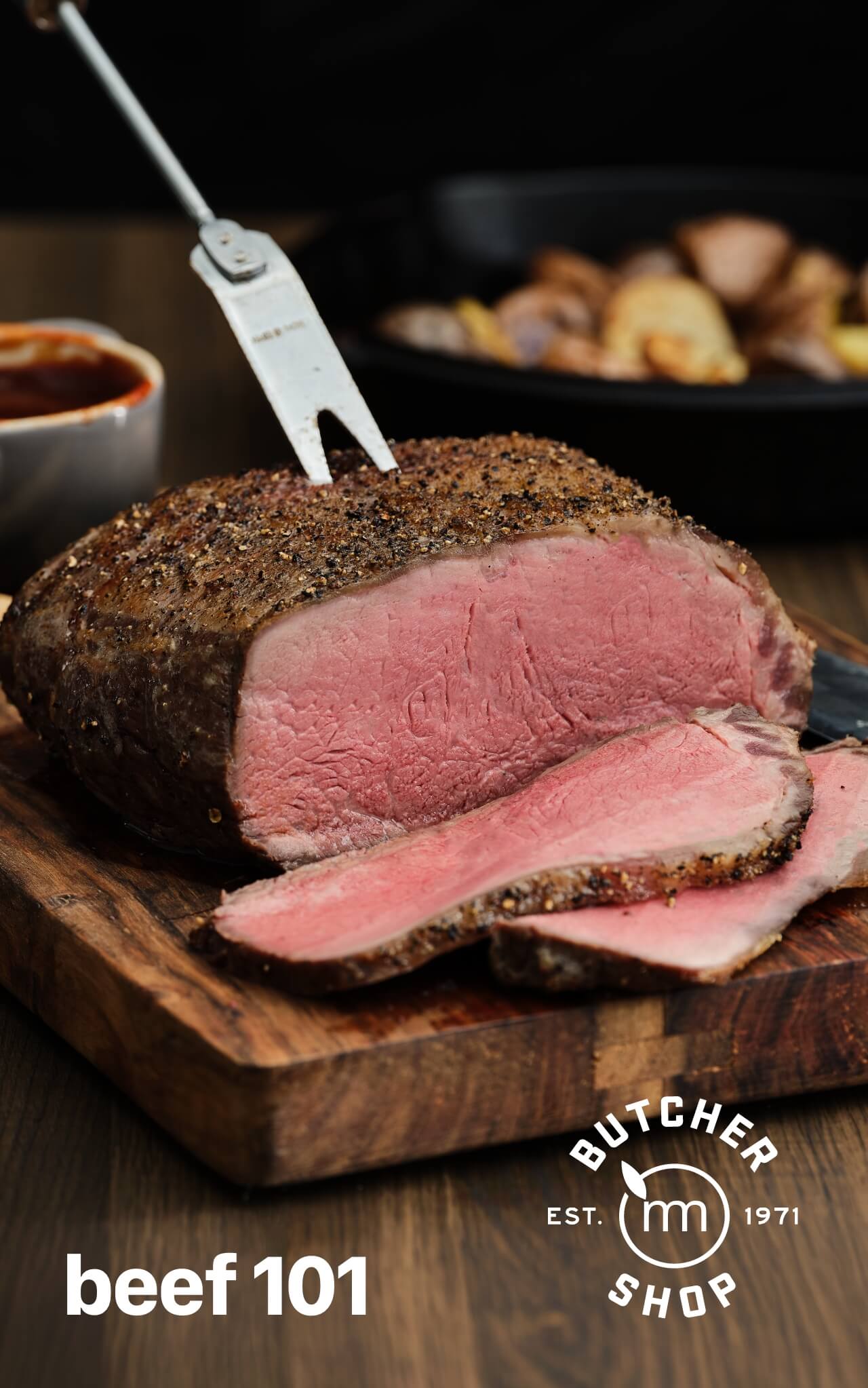 Beef 101. Butcher Shop Est. 1971. Image of beef roast and slices on butcher block.