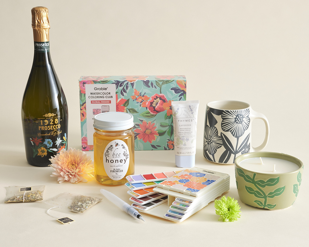 An assortment of gifts on cream background